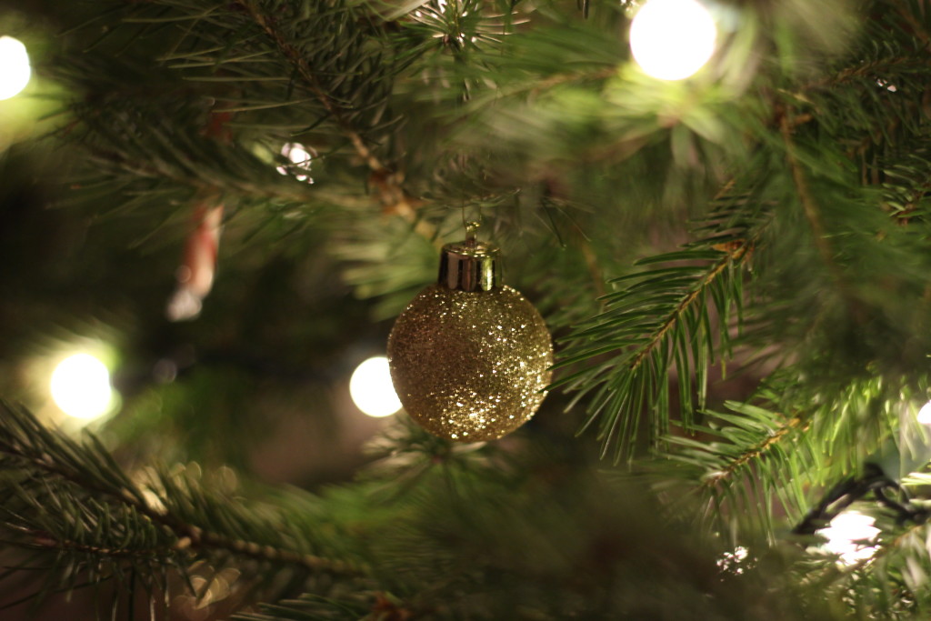 gold ornament and christmas tree