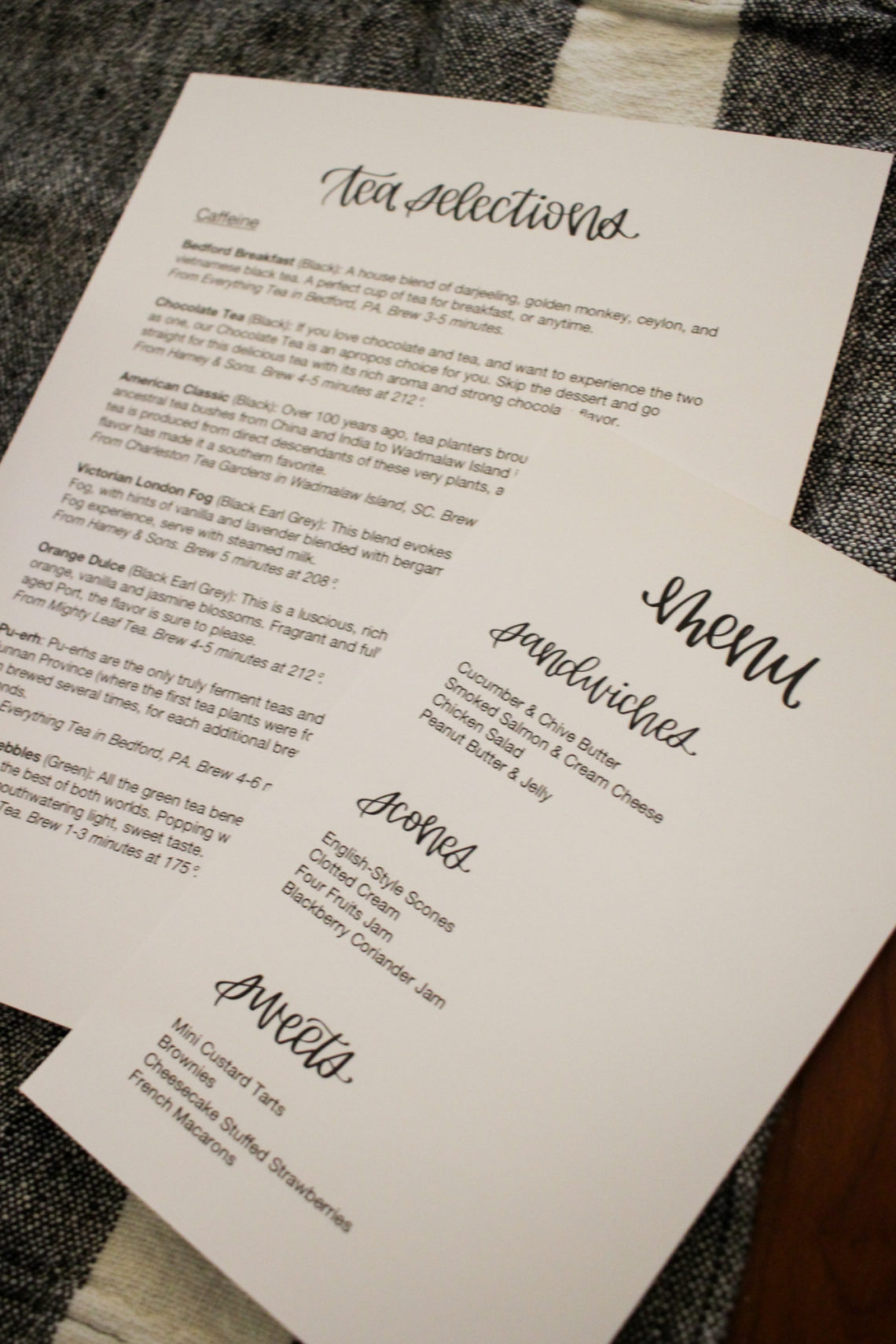Afternoon tea menu: Image of a tea selections list and menu, featuring hand-lettered headings.